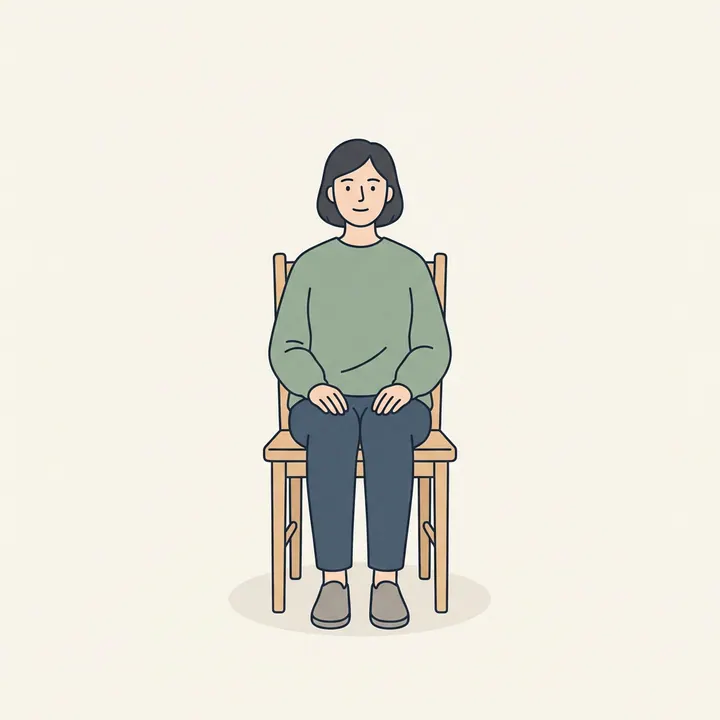 A single calm person sitting perfectly still on a chair in empty space